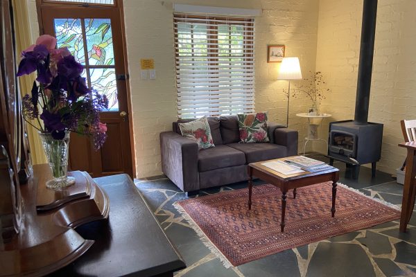 Galah fireplace and couch